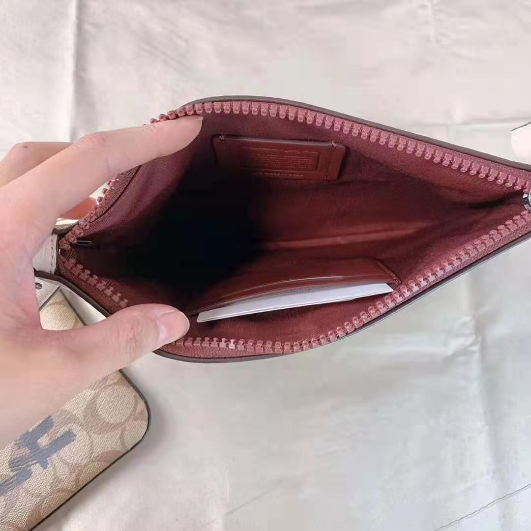 Coach 2656 Vale Gallery Pouch In Signature Canvas With Rexy By Guang Yu In Light Khaki/Chalk Multi Coach 2656 Vale Gallery Pouch In Signature Canvas With Rexy By Guang Yu In Light Khaki/Chalk Multi